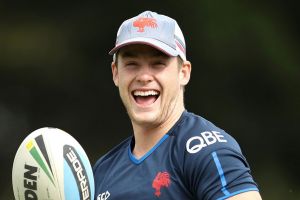 SYDNEY, AUSTRALIA - FEBRUARY 27: Luke Keary shares a joke with a team mate during the Sydney Roosters NRL training ...