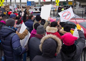 Protest at John F. Kennedy International Airport (JFK), Terminal 4, in New York City, against Donald Trump's executive order signed in January 2017 banning citizens of seven countries from traveling to the United States (the executive order is also known as "Protecting the Nation from Foreign Terrorist Entry into the United States").