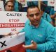 Sanjeev Sharma at the protest at Caltex head office in Sydney.