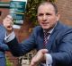 SYDNEY, NEW SOUTH WALES - OCTOBER 08: Auctioneer Mark Morrison brings the hammer down at the property auction of 388 ...