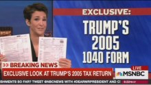 MSNBC host Rachel Maddow holds up two pages of Donald Trump's 2005 tax return