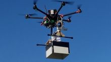 UNSW engineering drone "Flappy" in flight carrying a mock payload.