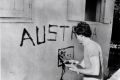 Greg Shackleton paints "Australia" on a shop wall in Balibo in East Timor in 1975. He and five other journalists were ...