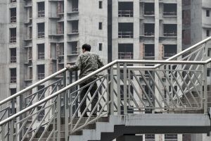 Residential buildings under construction in Chongqing, south-west China. The government may look to deter speculators ...