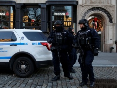 Members of the New York Police Department's Counterterrorism Bureau arrive to stand watch at the Union Square Holiday in Manhattan, New York City, U.S., December 20, 2016