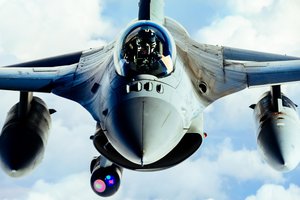 File - An Air Force F-16 Fighting Falcon refuels from a KC-135 Stratotanker in support of Operation Inherent Resolve, against the Islamic State of Iraq and Syria terrorists, Feb. 15, 2017.