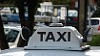 A generic taxi sign on the roof of an Adelaide cab