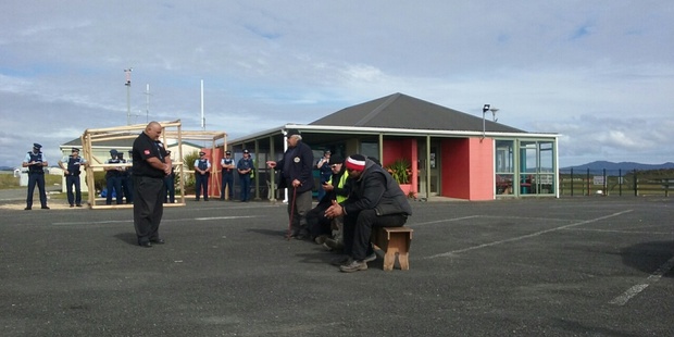 Evicted protesters at Kaitaia Airport. Photo / Edward Rooney