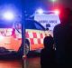 Paramedics treat a man in a helicopter at Coogee Beach.