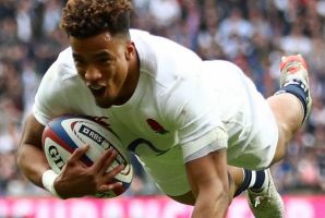 Anthony Watson of England scores his side's third try against Scotland.