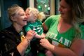 Margaret Hartigan, 79, with her great-granddaughter Eloise and granddaughter-in-law Alana Worthing at the Celtic Club.