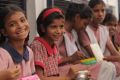 Students laugh at the Prerna Girls School, a place where girls are taught their rights as women in the world.