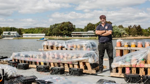 Pyrotechnic Fortunato Foti, of Foti International Fireworks, setting up fireworks for this year's Skyfire.