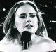 Adele, performing at Etihad Stadium, felt compelled to point out her big-screen image had some flattering filters on it.