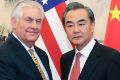 Chinese Foreign Minister Wang Yi (right), meets with US Secretary of State Rex Tillerson in Beijing Saturday.