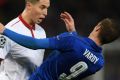 Shocked: Samir Nasri of Sevilla and Jamie Vardy of Leicester City clash.