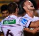 TOWNSVILLE, AUSTRALIA - MARCH 18: Jorge Taufua (r) of the Sea Eagles celebrates after scoring a try during the round ...