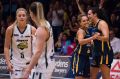 Buzzing: Sydney's Leilani Mitchell and Alex Wilson celebrate their game one win in the grand final series.