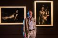 Bill Henson with some of the works in the NGV exhibition.