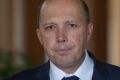 Immigration Minister Peter Dutton warned the Turnbull government was "not going to be bullied" by chief executives "or ...