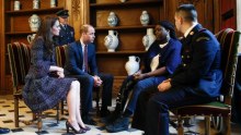 The Duchess of Cambridge and Prince William visit patients at the military hospital in Paris, France.