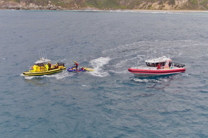 An aerial view of two sea rescue boats and a jet-ski in the water at Salmon Holes in Albany.