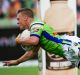 Stampede: Jack Wighton adds to the Tigers' misery.