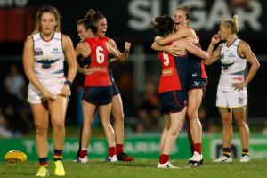 DARWIN, AUSTRALIA - MARCH 11: Players react as the final siren sounds during the 2017 AFLW Round 06 match between the ...