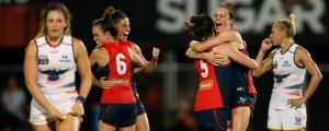 DARWIN, AUSTRALIA - MARCH 11: Players react as the final siren sounds during the 2017 AFLW Round 06 match between the ...