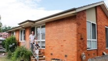 Trevor Hickman outside his ex-government home in Curtin.