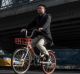 A rider on a Mobike in Beijing. Mobike and Ofo are the market leaders in bike-sharing in cities across China. 