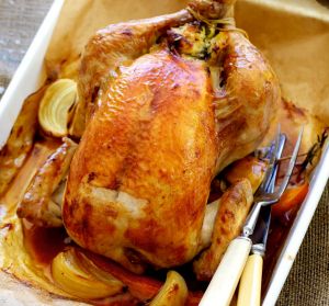 Adam Liaw's classic roast chicken with bread and butter stuffing. 