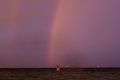 A man swims at Middle Park last week, as a cold front moved through the city.