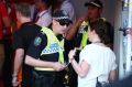 Investigation: Police speak to Adelaide staff in the tunnel after allegations Brisbane assistant coach Ross Aloisi ...