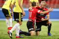 SYDNEY, AUSTRALIA - MARCH 19: Brendon Santalab of the Wanderers celebrates with team mate Mitch Nichols after scoring ...