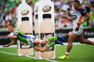 Stampede: Jack Wighton adds to the Tigers' misery.