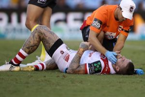 Floored: Josh Dugan lay motionless for 30 seconds after copping an elbow to the face from teammate Russell Packer.
