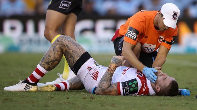 Floored: Josh Dugan lay motionless for 30 seconds after copping an elbow to the face from teammate Russell Packer.