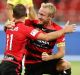 SYDNEY, AUSTRALIA - MARCH 19: Brendon Santalab of the Wanderers celebrates with team mate Mitch Nichols after scoring ...