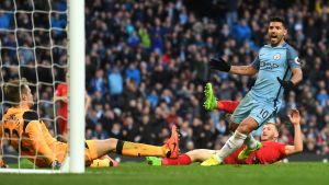 MANCHESTER, ENGLAND - MARCH 19:  Sergio Aguero of Manchester City celebrates scoring his sides first goal during the ...