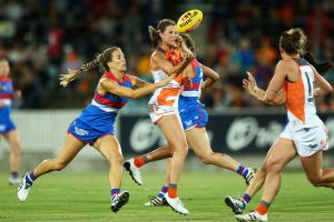 Nicola Barr of the Giants handballs during the round seven AFL Women's match.