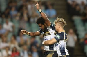 Henry Speight of the Brumbies celebrates with his team mate Jordan Jackson-Hope of the Brumbies