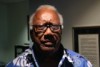 A South Sea Islander man wearing glasses