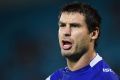 GOLD COAST, AUSTRALIA - MARCH 22: James McManus of the Knights speaks to his team mates during the round three NRL match ...