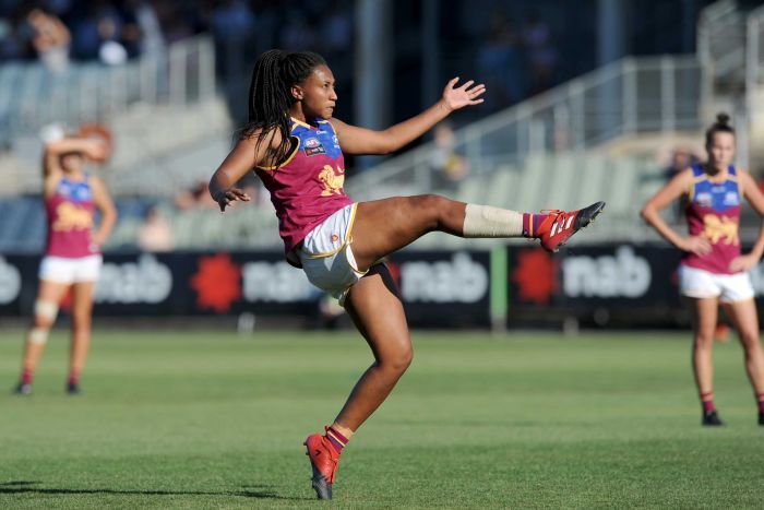 Sabrina Frederick-Traub of the Lions kicks a goal in the final quarter