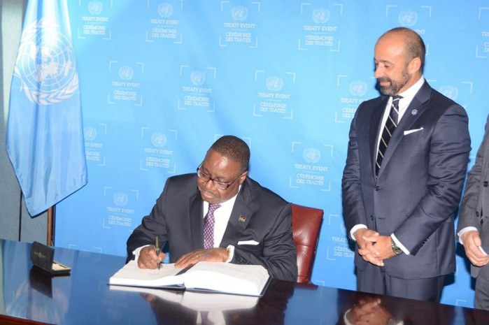 H.E., President Arthur Peter Mutharika, signs the Paris Agreement on Climate Change at the United Nations on September 20, 2016, in the presence of the Under-Secretary General for Legal Affairs and United Nations Legal Counsel, Miguel de Serpa Soares