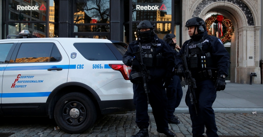 Members of the NYPD's Counterterrorism Bureau stand watch at the Union Square Holiday Market in Manhattan, December 20, 2016