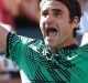 INDIAN WELLS, CA - MARCH 19: Roger Federer of Switzerland celebrates after defeating Stanislas Wawrinka of Switzerland ...