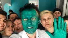 In this photo provided by Alexei Navalny, Russian opposition leader Alexei Navalny takes a selfie with supporters after ...