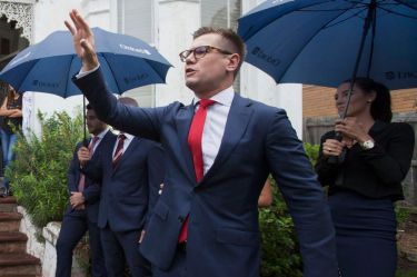 Auctioneer Jesse Davidson of AuctionWorks at the auction of 5 George Street, Marrickville, which sold for $1.77 million over reserve.